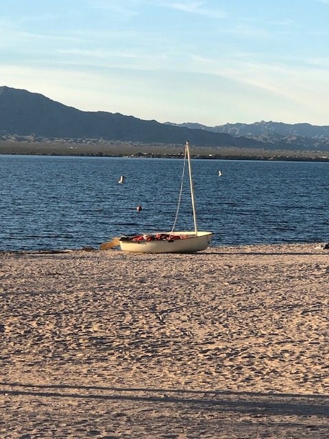 Sail Boat on the Beach at the end of the day